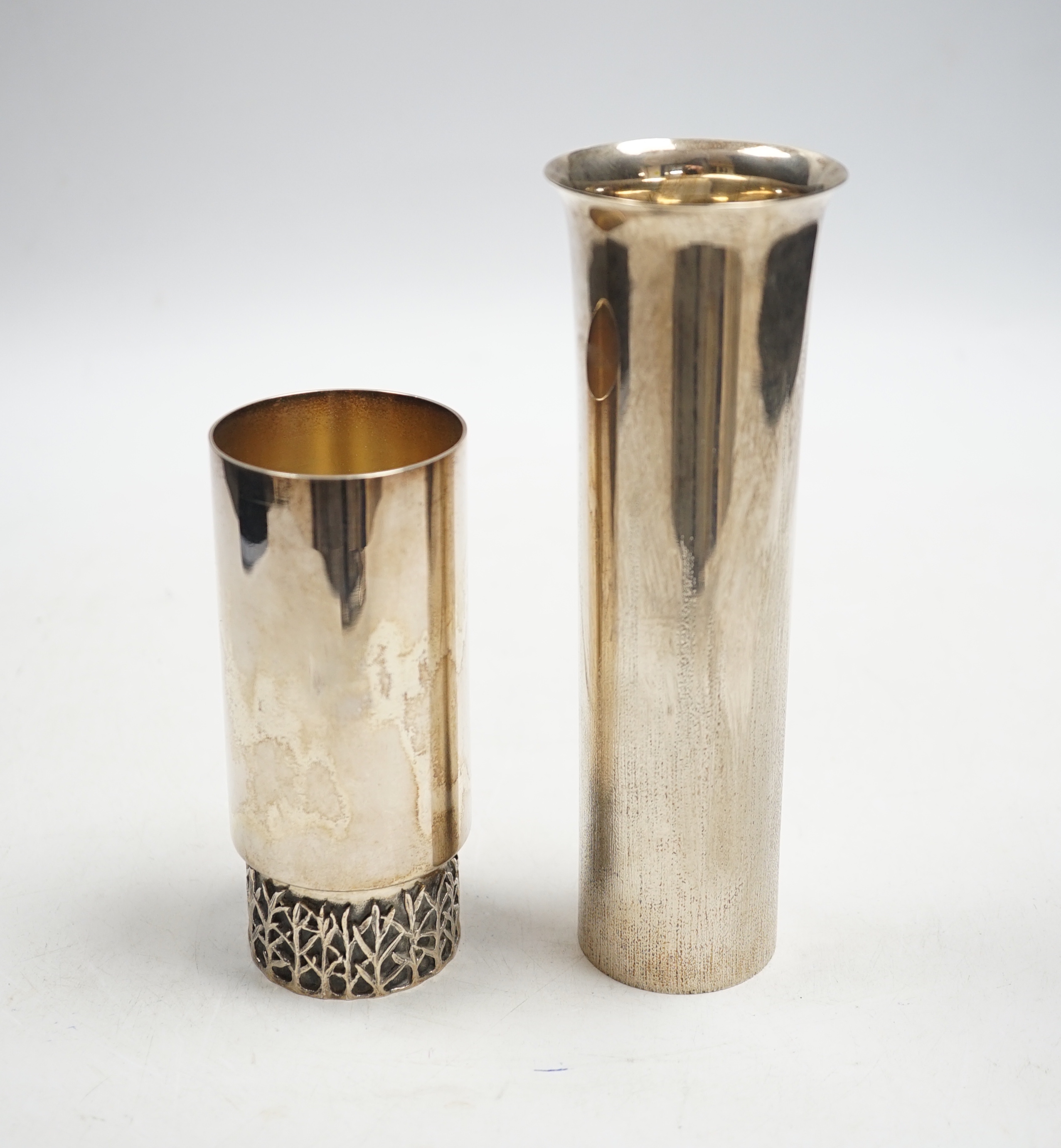 Two Elizabeth II silver cylinder vases, by Christopher Nigel Lawrence, including antler range vase, with certificate, 12.3cm, Edinburgh, 1970, the taller vase, London, 1970, 15.6oz.